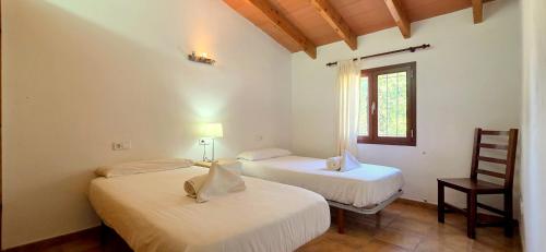 Postel nebo postele na pokoji v ubytování NEW Finca rustica con piscina