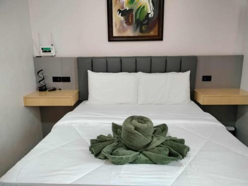 Postel nebo postele na pokoji v ubytování Lauriz Place 2 at Amani Grand Resort and Residences