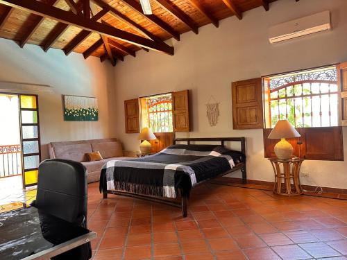 Postel nebo postele na pokoji v ubytování Paradise San Jeronimo Parcelacion 6BR AC Pool