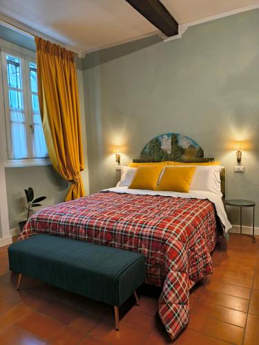 Giường trong phòng chung tại Il Sonetto - Boutique Apartment Suite - Breakfast