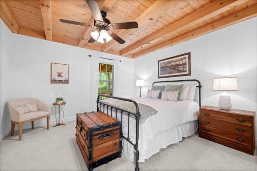 a bedroom with a bed and a ceiling fan at Vista View in Sugar Grove