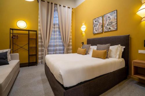 Postel nebo postele na pokoji v ubytování Maison Luxury Plaza