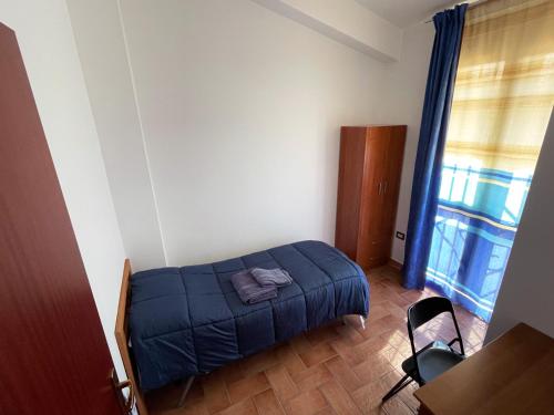 Postel nebo postele na pokoji v ubytování Wohnung 1 Zwei Zimmer Wohnung In Cattolica Eraclea