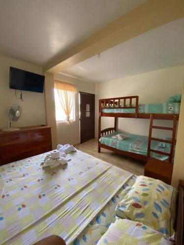 Ένα ή περισσότερα κρεβάτια σε δωμάτιο στο Casa Samay - Alojamiento