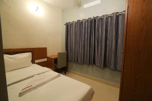 Ένα ή περισσότερα κρεβάτια σε δωμάτιο στο Hotel Riviera