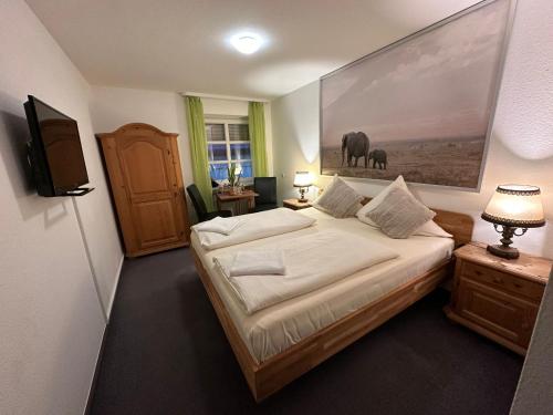 Postel nebo postele na pokoji v ubytování Hotel Goldene Rose