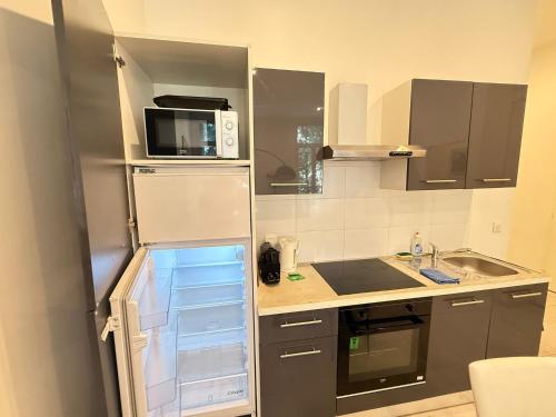 Kuchyň nebo kuchyňský kout v ubytování Marseille 01