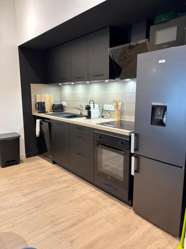 Køkken eller tekøkken på Le Duplex du centre