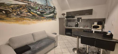 Kuchyň nebo kuchyňský kout v ubytování La becassine