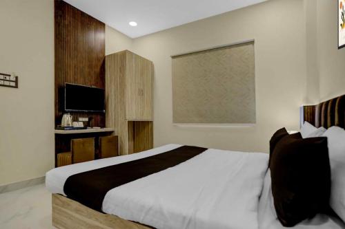 Postel nebo postele na pokoji v ubytování Townhouse Oak Kaal Bhairav Temple