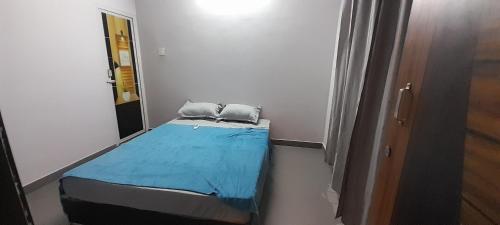 Ένα ή περισσότερα κρεβάτια σε δωμάτιο στο 1e villa