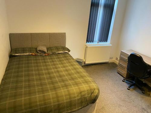 Ένα ή περισσότερα κρεβάτια σε δωμάτιο στο Conway Home of Relaxations