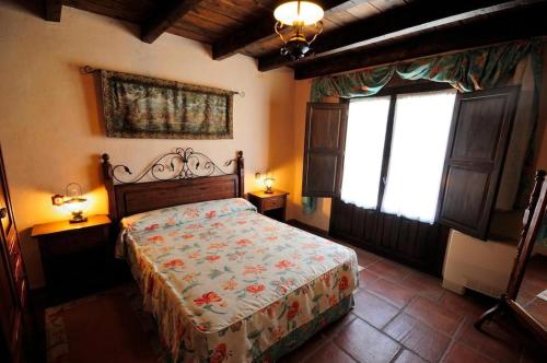 Postel nebo postele na pokoji v ubytování Posada Restaurante Ducal