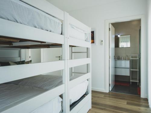 Ένα ή περισσότερα κρεβάτια σε δωμάτιο στο Villa das Hortas - modern villa at Silvercoast - Portugal