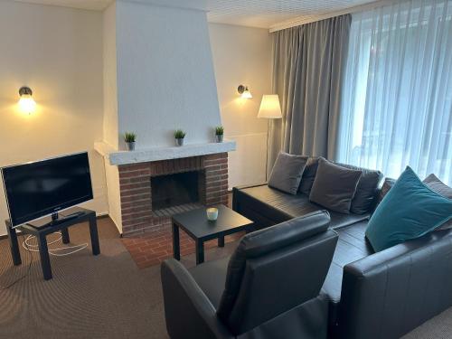 TV a/nebo společenská místnost v ubytování Villa Blue - Cuxhaven