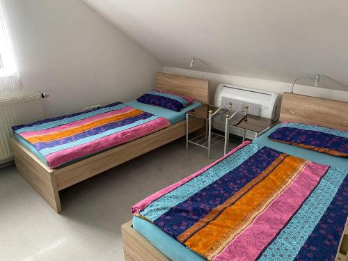 Postel nebo postele na pokoji v ubytování Haus Krönert