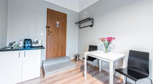 Kuchyňa alebo kuchynka v ubytovaní Fenna Apartments 7 minut od Rynku