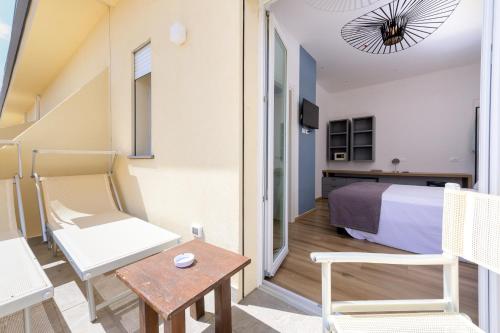 Χώρος καθιστικού στο Hotel Perla