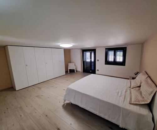 Ένα ή περισσότερα κρεβάτια σε δωμάτιο στο Villino Elvira