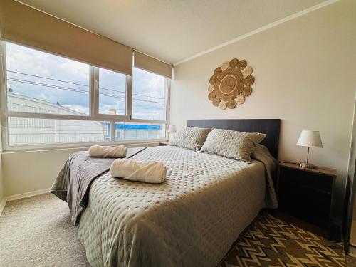 En eller flere senge i et værelse på Apart Total 312