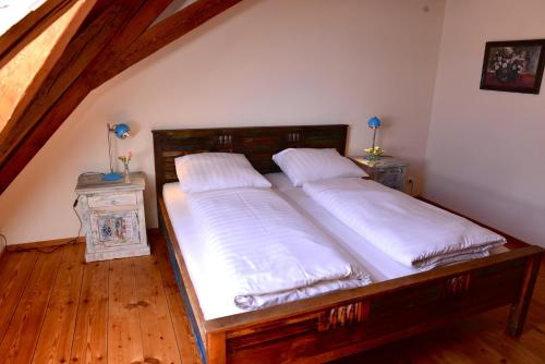 Кровать или кровати в номере Hotel Maurerhansl