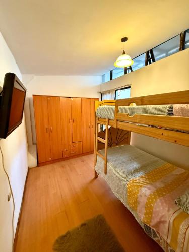 Giường trong phòng chung tại Casa Luz