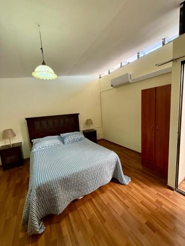 Giường trong phòng chung tại Casa Luz