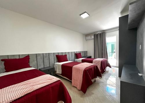 Ein Bett oder Betten in einem Zimmer der Unterkunft Casa de Praia - Brisa do Mar