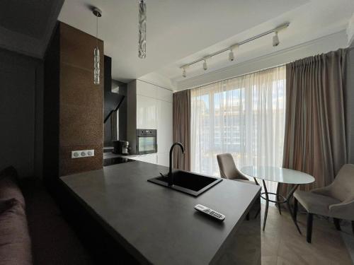 Televisor o centre d'entreteniment de MidTown Residence Delux