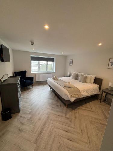 Ένα ή περισσότερα κρεβάτια σε δωμάτιο στο Bay View