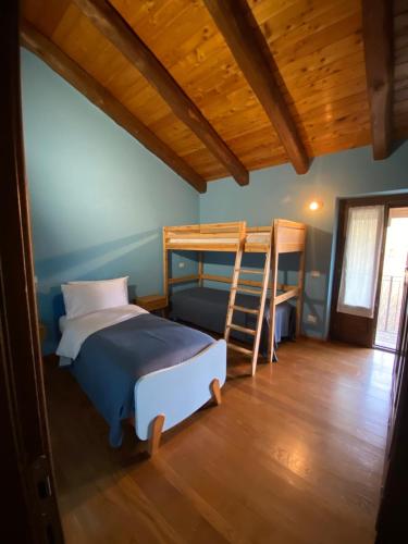 Ένα ή περισσότερα κρεβάτια σε δωμάτιο στο Le Notti Magiche