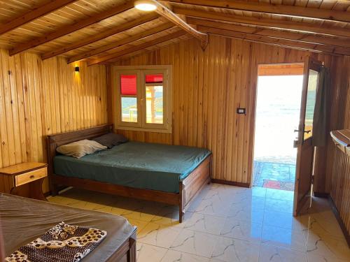 Postel nebo postele na pokoji v ubytování white dune camp