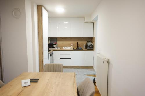 Kuchyň nebo kuchyňský kout v ubytování Apartment Verano