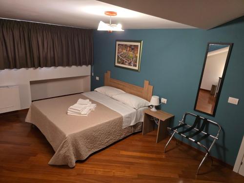 Postel nebo postele na pokoji v ubytování Villa Cristina