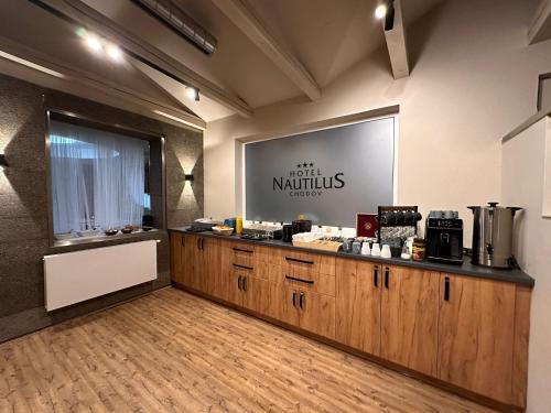 Kuchyň nebo kuchyňský kout v ubytování hotel Nautilus
