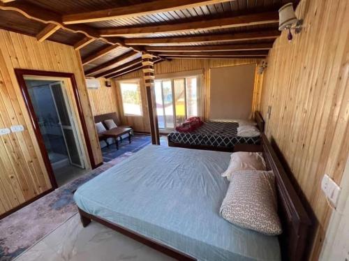 Postel nebo postele na pokoji v ubytování white dune camp