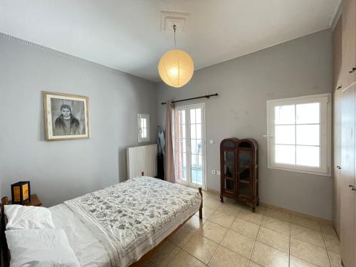 Ένα ή περισσότερα κρεβάτια σε δωμάτιο στο Grande Deluxe Home