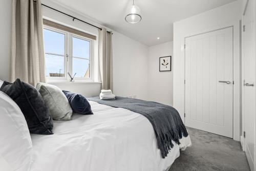 Postel nebo postele na pokoji v ubytování Foxden House