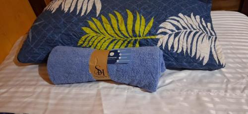 Ένα ή περισσότερα κρεβάτια σε δωμάτιο στο Hospedaje Rural