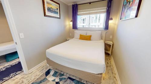 Ένα ή περισσότερα κρεβάτια σε δωμάτιο στο Sea Cabins 342C