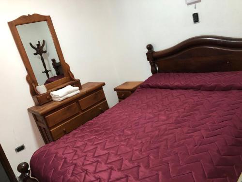 Ein Bett oder Betten in einem Zimmer der Unterkunft santa rita 2