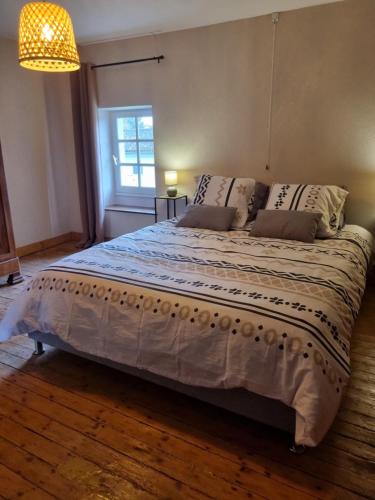 Postel nebo postele na pokoji v ubytování Gite Mani et Princesse à partir de 2 à 6 personnes