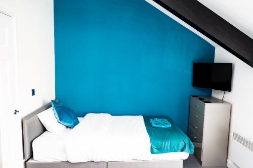 Postel nebo postele na pokoji v ubytování Luton Grove