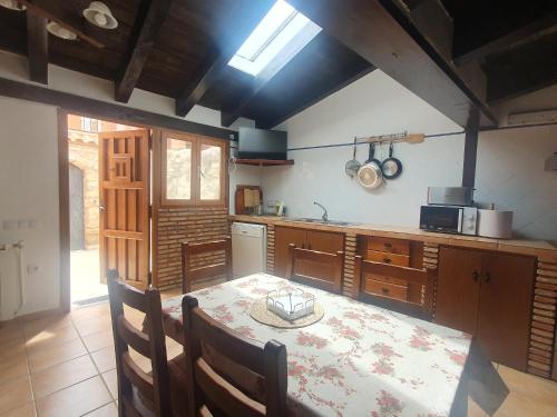 Kuchyň nebo kuchyňský kout v ubytování Cielos de Celadas