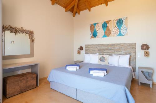 Postel nebo postele na pokoji v ubytování Villa Dioni