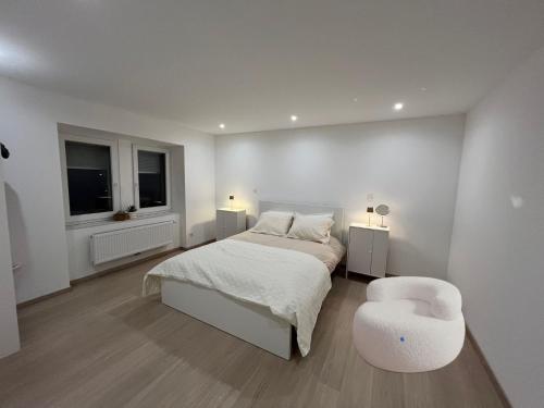 Postel nebo postele na pokoji v ubytování Chambre Élégance et confort a Esch