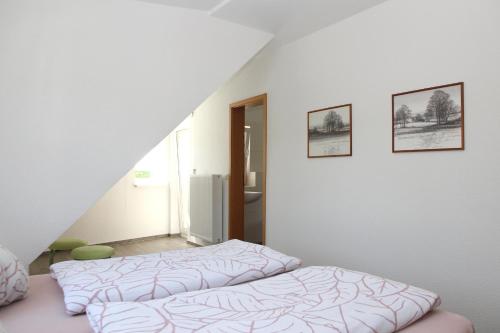 Postel nebo postele na pokoji v ubytování Ferienwohnung Im Tal Olsberg