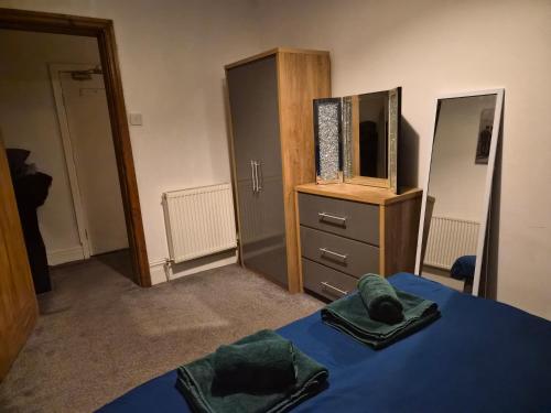 Postel nebo postele na pokoji v ubytování Blackpool Apartments