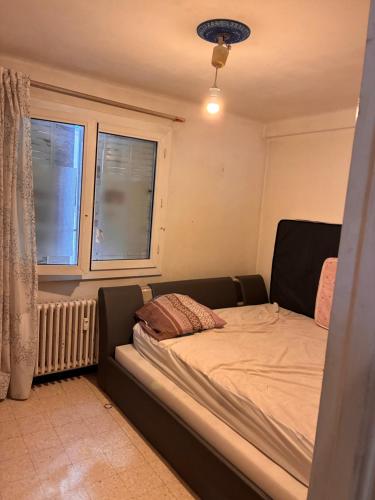 Llit o llits en una habitació de Ali