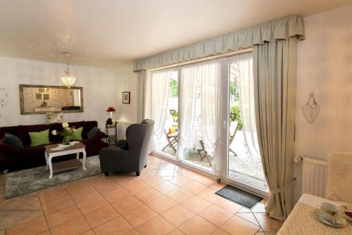 Posezení v ubytování Ferienhaus In Walkenried Mit Schöner Terrasse